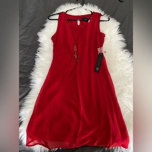 Red polyester dress. Size Small